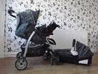 Petite Star fold down pram with all attachments full....